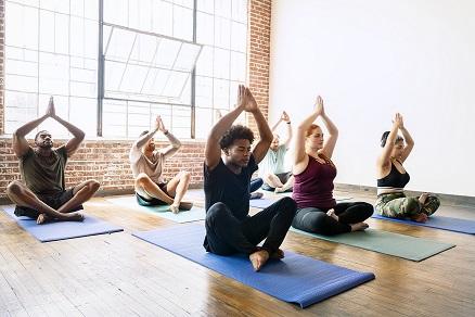 Diverse people in yoga pose